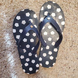 Navy flower flip flops